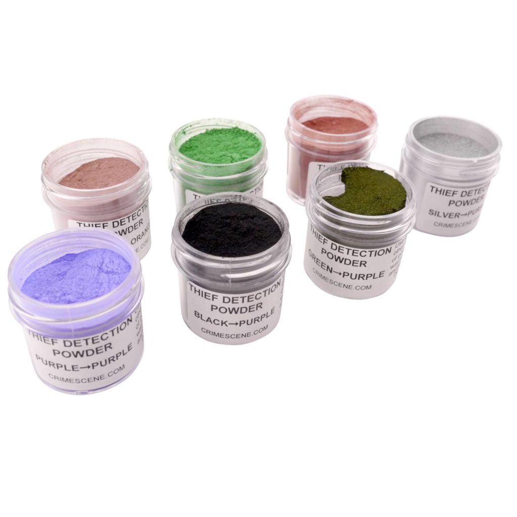 Array of different tinted theft detection powders